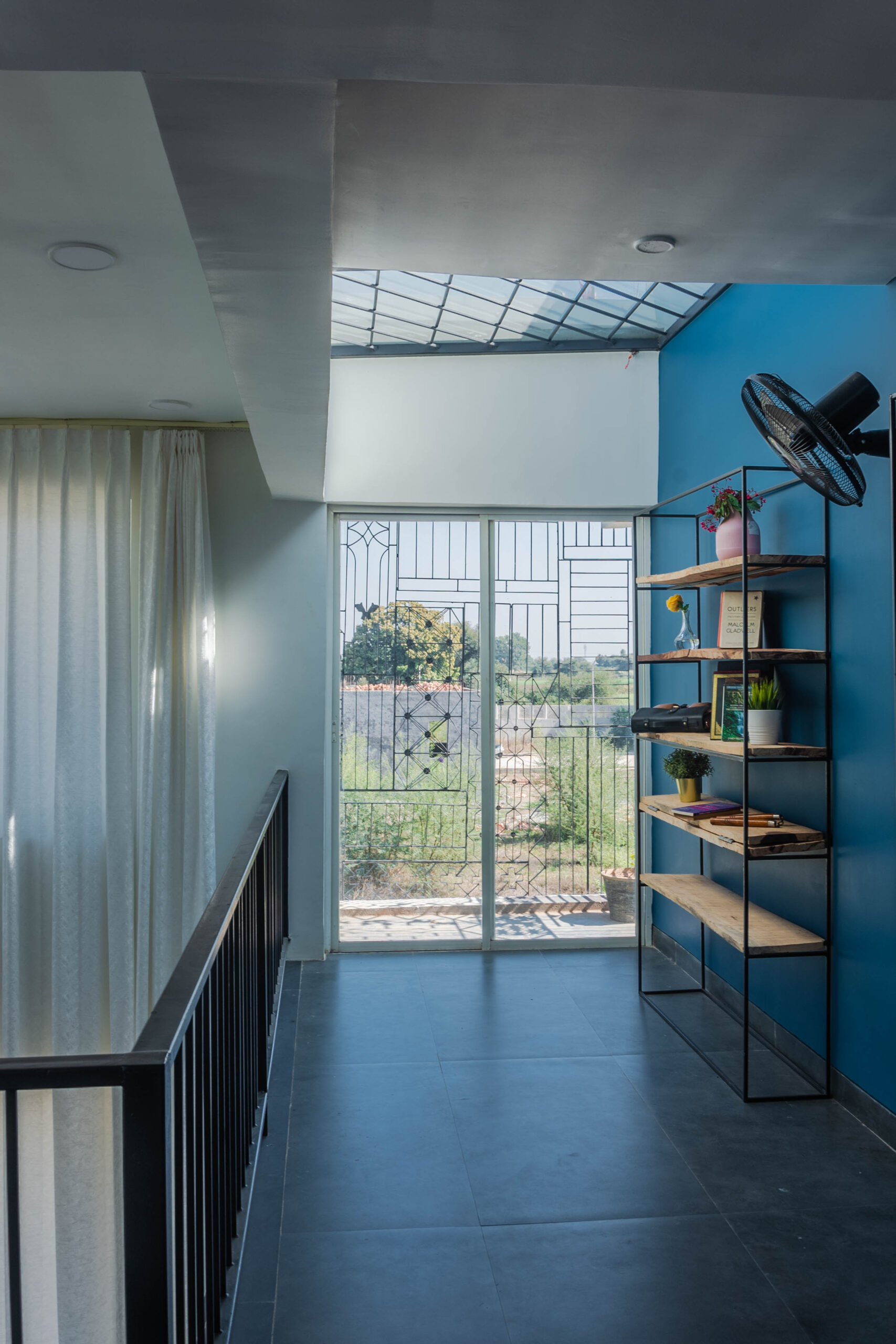 Well Lit Book Shelf with Window Jali